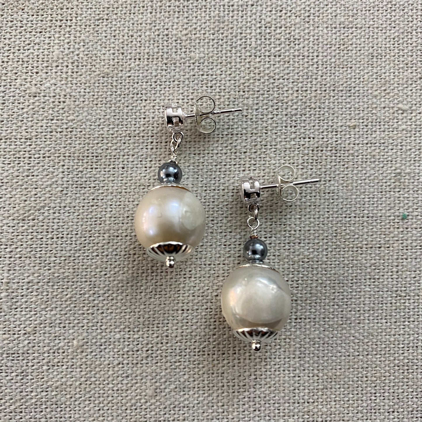 silver earrings with zirconia and pearls