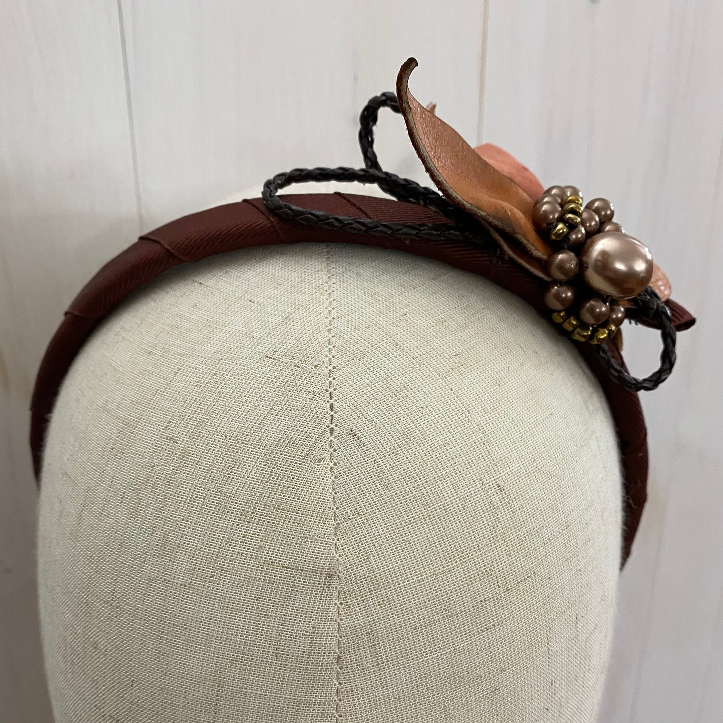 brown headband with flower