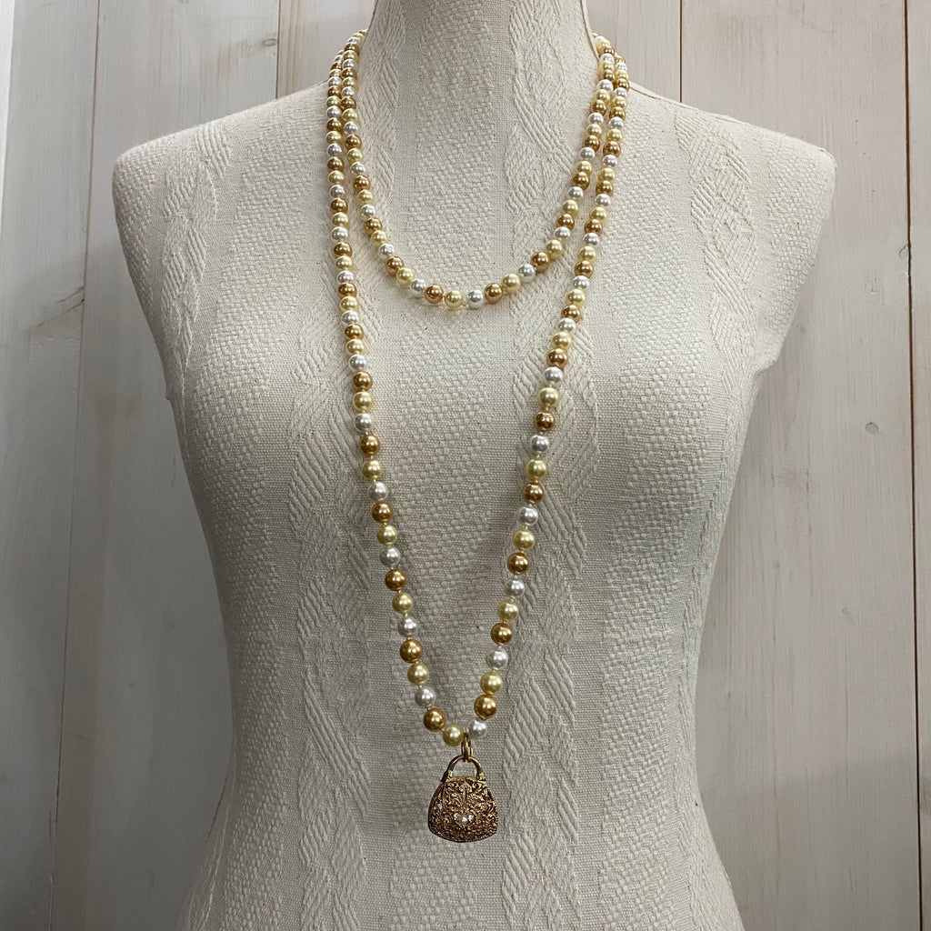 🆕 collana lunga in perle con ciondolo borsetta